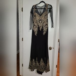 Maxi Black long sleeve evening dresssize Large like new worn once for couple ho